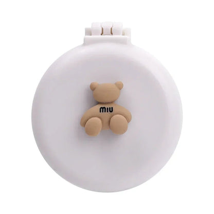 brosse a cheveux blanc ourson