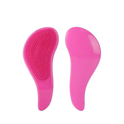 Brosse a cheveux rose fonce