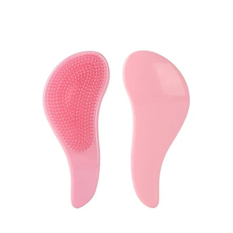 Brosse a cheveux rose pale