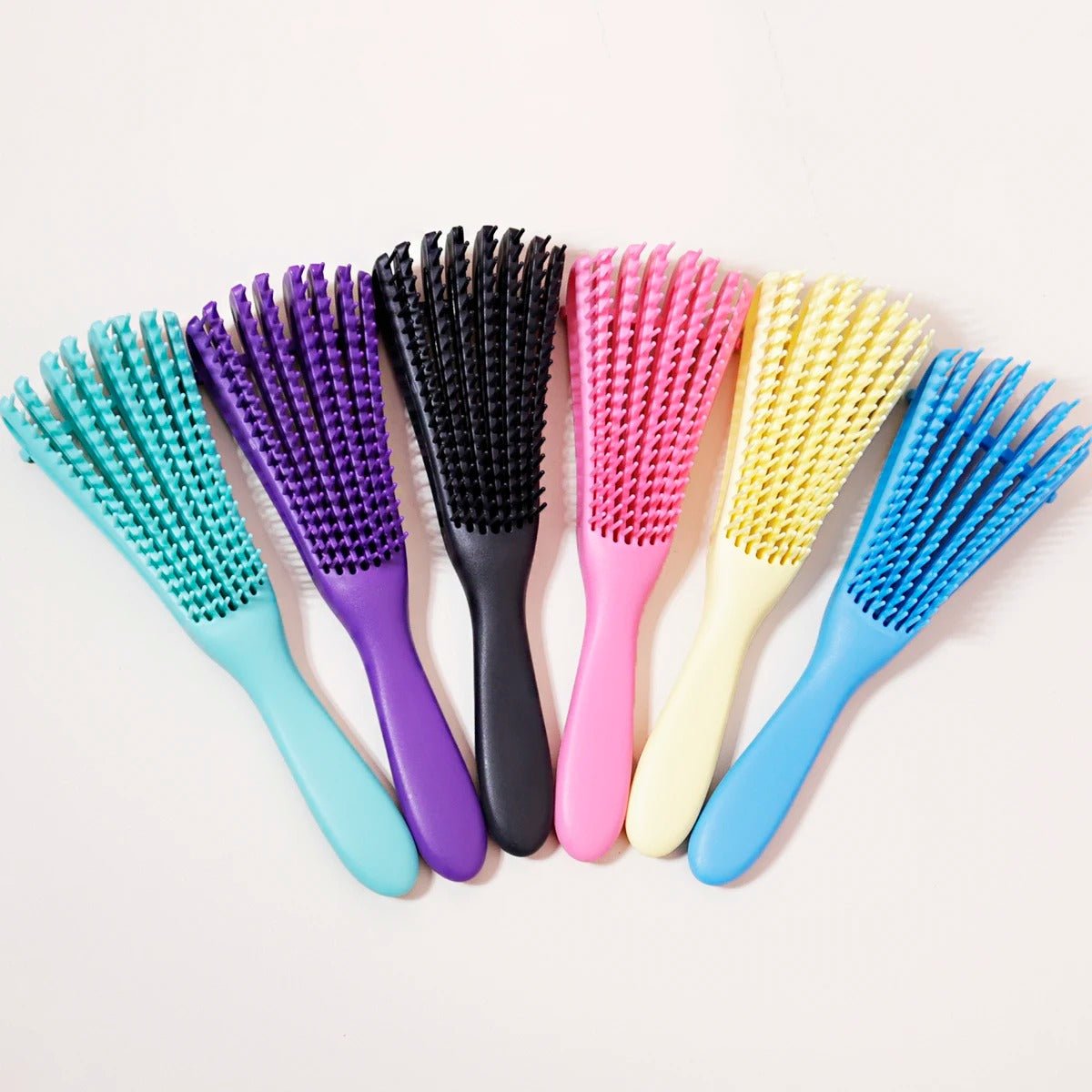 brosse cheveux boucles cinq couleur