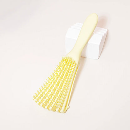 brosse cheveux boucles jaune