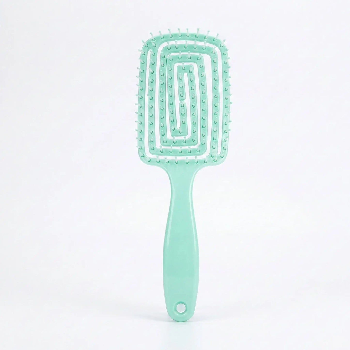 brosse pour cheveux vert